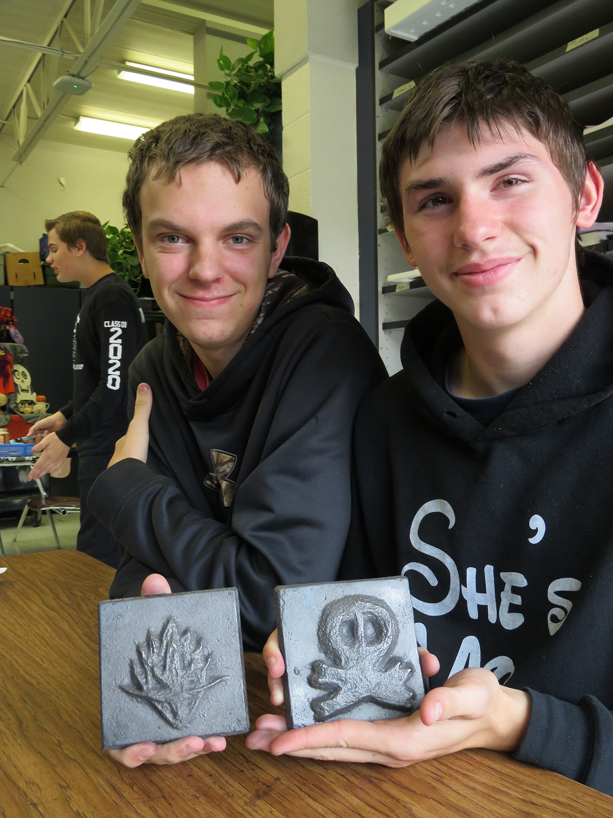 Brethren students with iron tiles